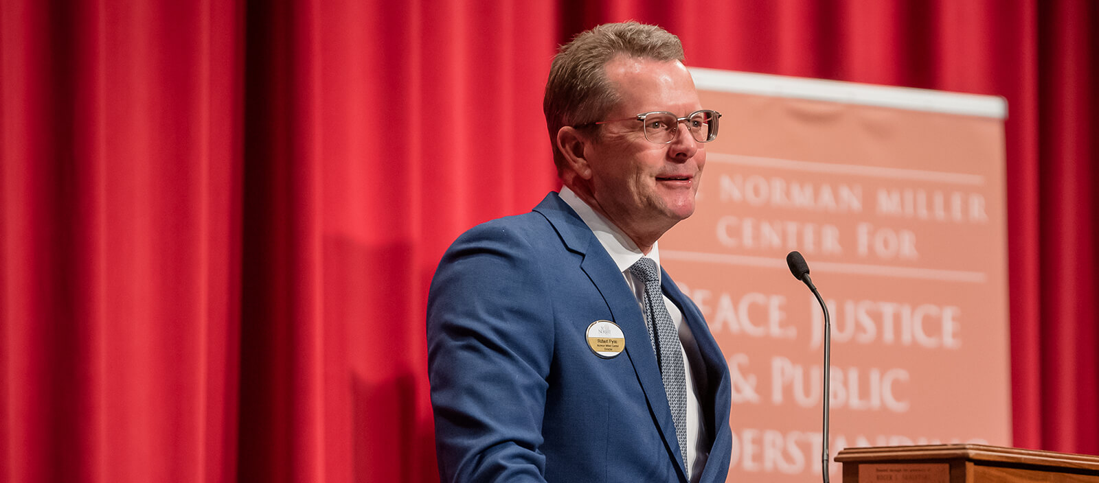 Professor Bob Pyne at a podium