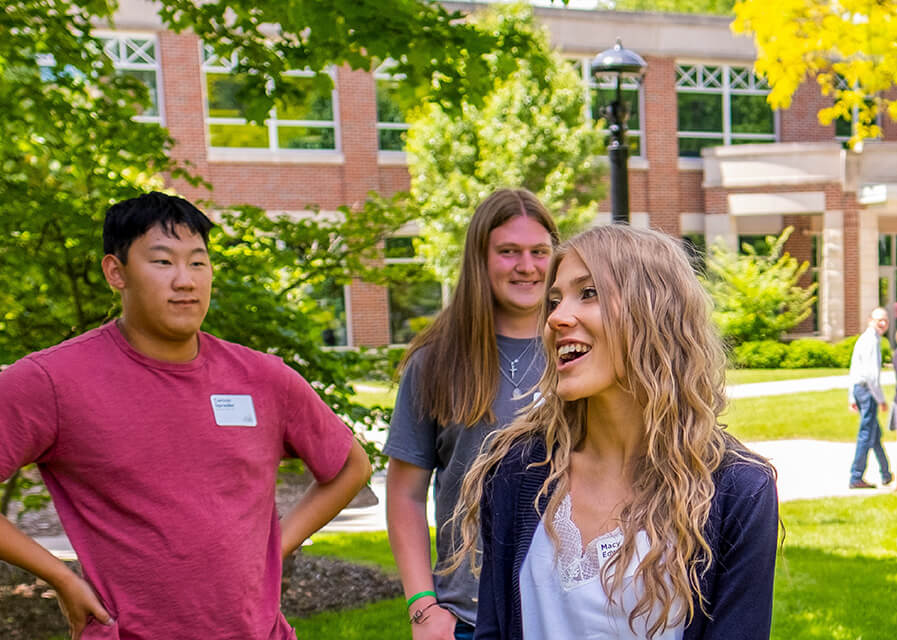 Students listening to tour guide