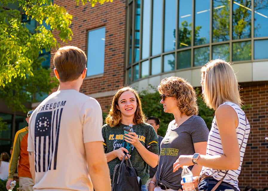 Student tour guides in a line