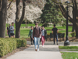 Students walk across campus at St. Norbert College