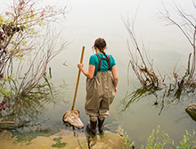 students wades in water