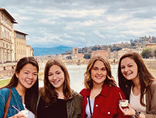 Students pose outside while studying abroad