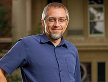 Eric Hagedorn poses outside of Boyle Hall