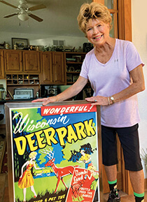 Ann Tollaksen with a Deer Park poster