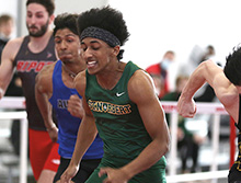 SNC track athlete sprints to the finish line during a meet